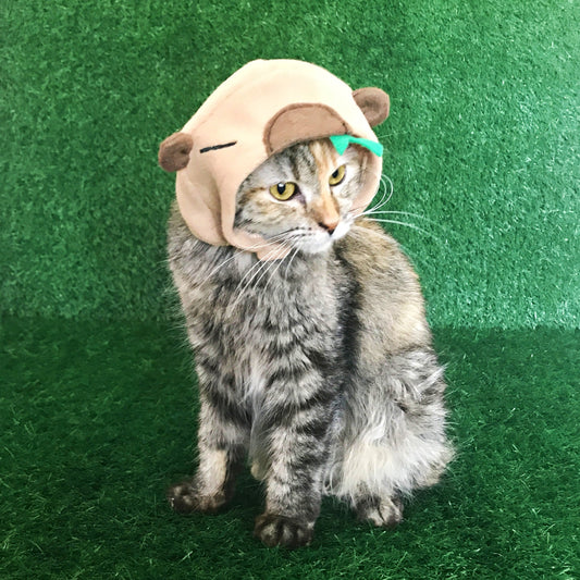 Side view of capybara cat costume hat handmade in tan plush-looking material
